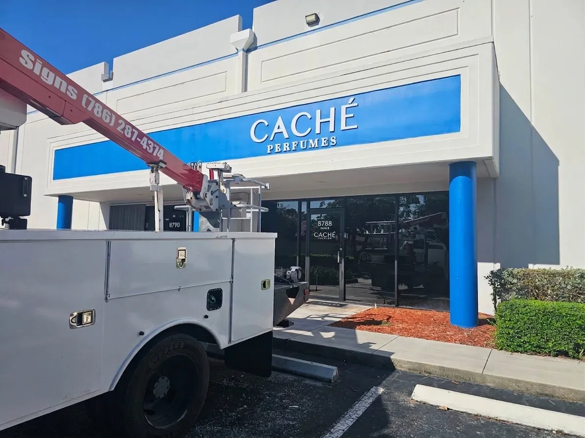 Dimensional letters for Caché Perfumes building sign installed in Miami
