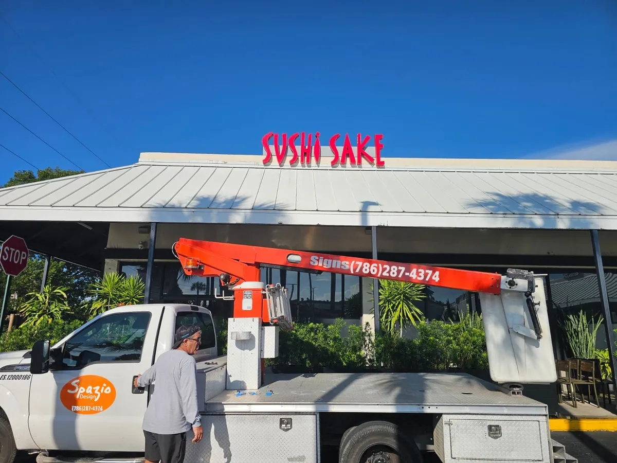 Red channel letters for Sushi Sake restaurant installed by Spazio Design in Miami